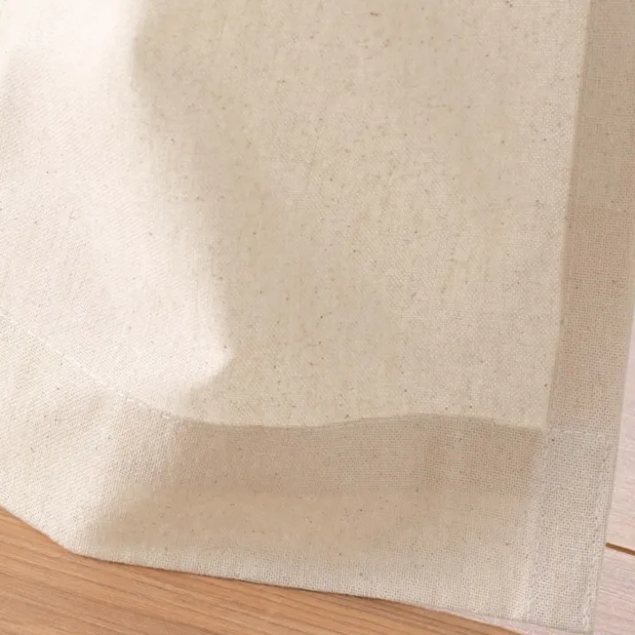 Rideau à œillets en poly-coton avec bande brodée