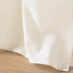 Rideau à œillets polycoton avec top tissé et pompons