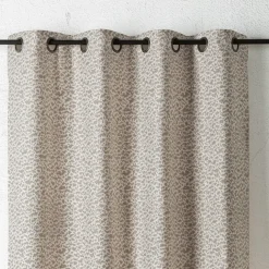 Rideau jacquard abstrait texturé à oeillets