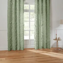 Rideau matelassé à œillets