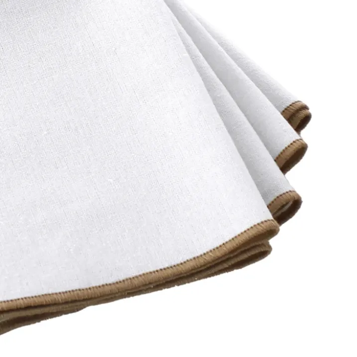 Serviette de table unie et bourdonnée