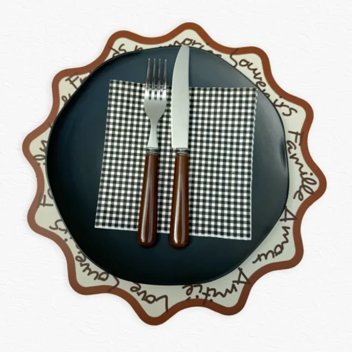 Set de table rond rigide avec écriture décorative