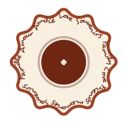 Set de table rond rigide avec écriture décorative