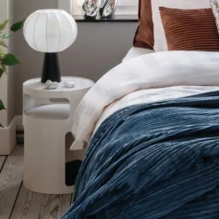 Table d’appoint ronde avec niches de rangement