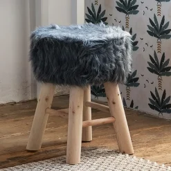 Tabouret avec assise en fourrure
