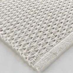 Tapis déco en coton tissé