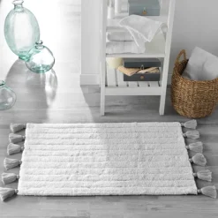 Tapis de bain uni et à pompons