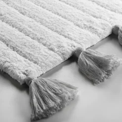 Tapis de bain uni et à pompons