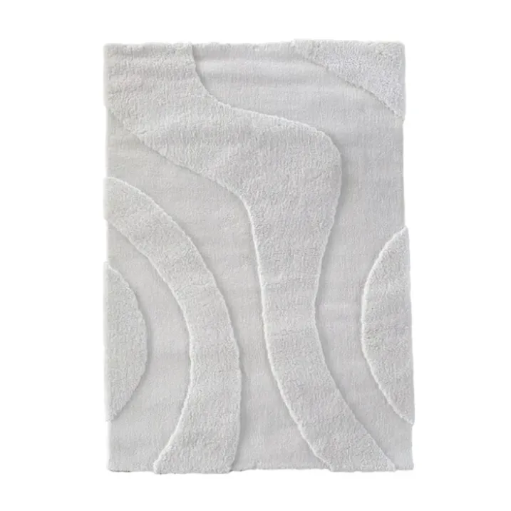 Tapis de salon motif ondulation en relief, effet texturé