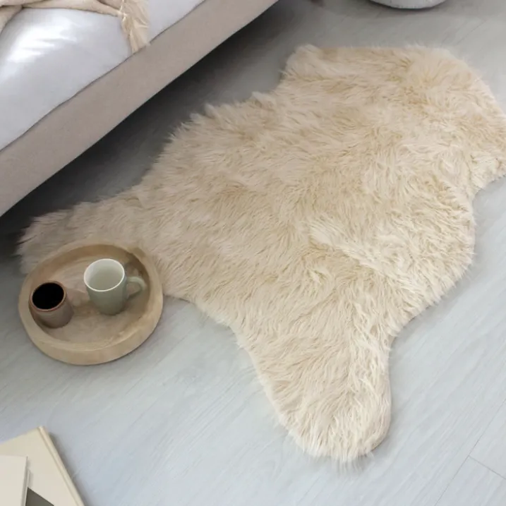 Tapis imitation peau de bête long poils et suédine