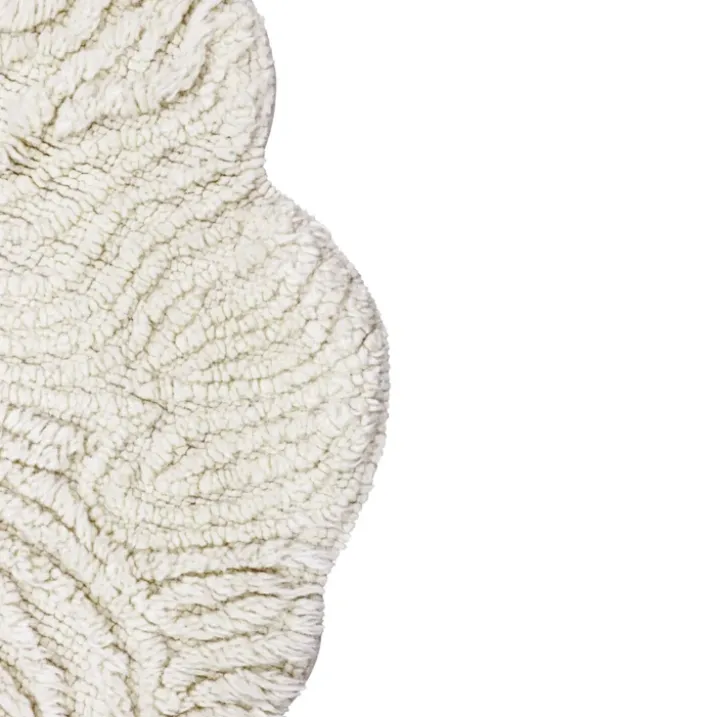 Tapis lavable en laine mouton au nez rose