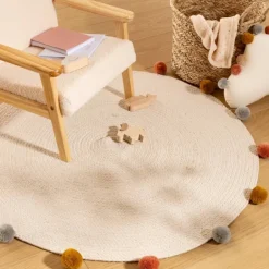 Tapis rond en coton et pompons