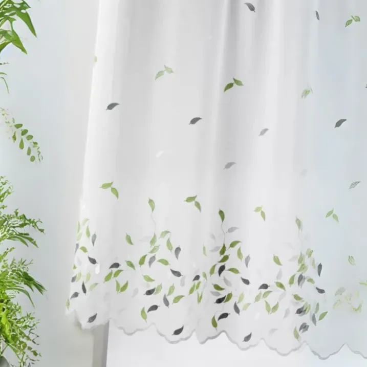 Voilage brodé feuilles avec bas festonné